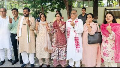 Congress candidate from Rewari assembly seat Chiranjeev Rao along with his wife Anushka Yadav, her father and party leader Captain Ajay Singh Yadav and other members of his family show their inked fingers after casting their votes in Rewari on Saturday. (ANI PHOTO) Congress candidate from Rewari assembly seat Chiranjeev Rao along with his wife Anushka Yadav, her father and party leader Captain Ajay Singh Yadav and other members of his family show their inked fingers after casting their votes in Rewari on Saturday. (ANI PHOTO)