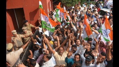 Congress supporters celebrating the victory of party candidate Chander Mohan Bishnoi outside the counting centre at Government College, Sector 1, in Panchkula on Tuesday. (Sant Arora/HT) Congress supporters celebrating the victory of party candidate Chander Mohan Bishnoi outside the counting centre at Government College, Sector 1, in Panchkula on Tuesday. (Sant Arora/HT)
