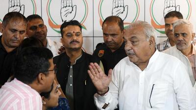 Former Haryana chief minister and senior Congress leader Bhupinder Singh Hooda speaks to reporters during a press conference in Delhi on Monday. (ANI)