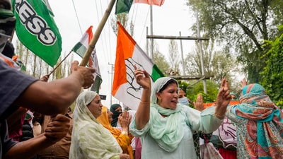 Supporters of Congress and National Conference (NC) celebrate as the Congress-NC alliance leads during the counting of votes of Jammu & Kashmir Assembly elections in Srinagar on October 8. (PTI) Supporters of Congress and National Conference (NC) celebrate as the Congress-NC alliance leads during the counting of votes of Jammu & Kashmir Assembly elections in Srinagar on October 8. (PTI)