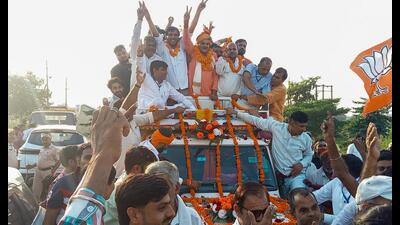 Laxman Singh Yadav, Bharatiya Janata Party candidate from the Rewari seat with his supporters after he won the election in Gurugram on Tuesday. (HT PHOTO) Laxman Singh Yadav, Bharatiya Janata Party candidate from the Rewari seat with his supporters after he won the election in Gurugram on Tuesday. (HT PHOTO)