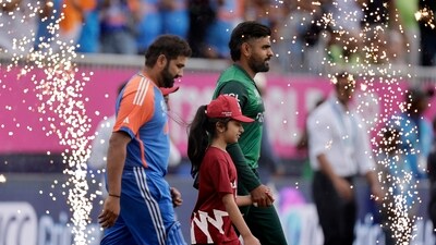 Pakistan batter Babar Azam, right, and India's captain Rohit Sharma. (PTI) Pakistan batter Babar Azam, right, and India's captain Rohit Sharma. (PTI)