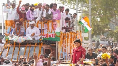 Congress candidate Vinesh Phogat greets supporters during her victory celebration after winning from Julana constituency in the Haryana Assembly elections, in Jind district, Haryana. (PTI)