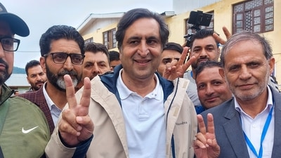Sajad Lone, chief of the People's Conference and party candidate, celebrated with supporters following his victory from the Handwara constituency in the Jammu and Kashmir Assembly elections on Tuesday. (PTI) Sajad Lone, chief of the People's Conference and party candidate, celebrated with supporters following his victory from the Handwara constituency in the Jammu and Kashmir Assembly elections on Tuesday. (PTI)