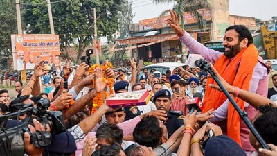 Haryana chief minister Nayab Saini greets supporters after winning the assembly elections from Ladwa constituency in Kurukshetra district, (PTI) Haryana chief minister Nayab Saini greets supporters after winning the assembly elections from Ladwa constituency in Kurukshetra district, (PTI)