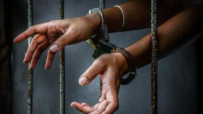 Prisoner in prison with handcuff (Getty Images/iStockphoto) Prisoner in prison with handcuff (Getty Images/iStockphoto)