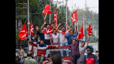 Srinagar: Jammu and Kashmir National Conference (JKNC) supporters celebrate as the party leads amid the counting of votes for the Jammu and Kashmir Assembly elections, in Srinagar, Tuesday, Oct. 8, 2024. (PTI Photo) (PTI) Srinagar: Jammu and Kashmir National Conference (JKNC) supporters celebrate as the party leads amid the counting of votes for the Jammu and Kashmir Assembly elections, in Srinagar, Tuesday, Oct. 8, 2024. (PTI Photo) (PTI)