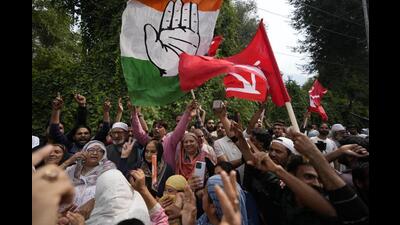 Supporters of the National Conference and the Congress celebrating early leads outside a counting centre on the outskirts of Srinagar on Tuesday. (AP Photo) Supporters of the National Conference and the Congress celebrating early leads outside a counting centre on the outskirts of Srinagar on Tuesday. (AP Photo)