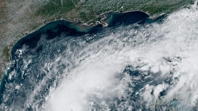 This handout satellite image courtesy of the National Oceanic and Atmospheric Administration (NOAA) and the Regional and Mesoscale Meteorology Branch (RAMMB) shows hurricane Milton churning over the Gulf of Mexico on October 7, 2024. Hurricane Milton exploded in strength Monday to become a potentially catastrophic Category 5 storm bound for Florida, threatening the US state with a second ferocious hurricane in as many weeks. (Photo by HANDOUT / NOAA / AFP) / RESTRICTED TO EDITORIAL USE - MANDATORY CREDIT "AFP PHOTO / NOAA / RAMMB" - NO MARKETING NO ADVERTISING CAMPAIGNS - DISTRIBUTED AS A SERVICE TO CLIENTS (AFP) This handout satellite image courtesy of the National Oceanic and Atmospheric Administration (NOAA) and the Regional and Mesoscale Meteorology Branch (RAMMB) shows hurricane Milton churning over the Gulf of Mexico on October 7, 2024. Hurricane Milton exploded in strength Monday to become a potentially catastrophic Category 5 storm bound for Florida, threatening the US state with a second ferocious hurricane in as many weeks. (Photo by HANDOUT / NOAA / AFP) / RESTRICTED TO EDITORIAL USE - MANDATORY CREDIT "AFP PHOTO / NOAA / RAMMB" - NO MARKETING NO ADVERTISING CAMPAIGNS - DISTRIBUTED AS A SERVICE TO CLIENTS (AFP)