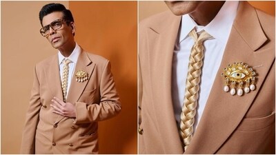 Karan Johar wears the Schiaparelli braided-hair neck tie. Karan Johar wears the Schiaparelli braided-hair neck tie.
