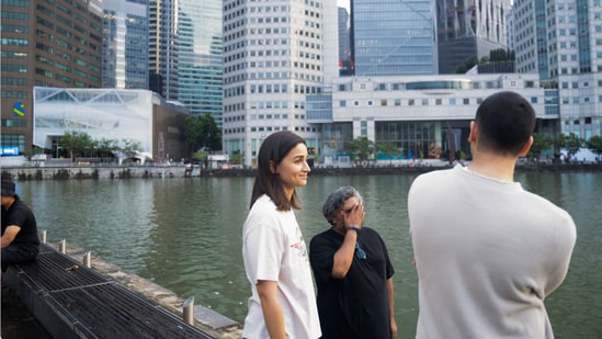Alia Bhatt and Vedang Raina share a light moment at the Singapore River. The film releases on October 11.