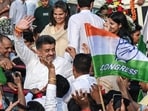 Congress candidate Chander Mohan celebrates his win from the Panchkula assembly seat.