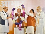 Prime Minister Narendra Modi being facilitated by Union minister and BJP national president JP Nadda, home minister Amit Shah and defence minister Rajnath Singh at the party headquarters in New Delhi on October 8, 2024. Prime Minister Narendra Modi being facilitated by Union minister and BJP national president JP Nadda, home minister Amit Shah and defence minister Rajnath Singh at the party headquarters in New Delhi on October 8, 2024.