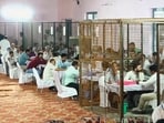 Counting of votes at a centre for Haryana Assembly polls in Jind on October 8.