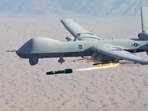 US Predator drone firing Hellfire missile.