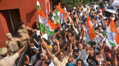 Congress supporters celebrating the victory of party candidate Chander Mohan Bishnoi outside the counting centre at Government College, Sector 1, in Panchkula on Tuesday. (Sant Arora/HT) Congress supporters celebrating the victory of party candidate Chander Mohan Bishnoi outside the counting centre at Government College, Sector 1, in Panchkula on Tuesday. (Sant Arora/HT)