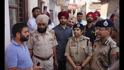 DGP Gaurav Yadav (right), along with other officials, interacting with a resident in Balongi, Mohali, on Wednesday. DGP Gaurav Yadav (right), along with other officials, interacting with a resident in Balongi, Mohali, on Wednesday.