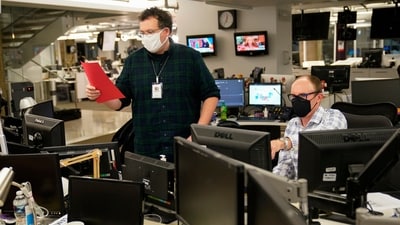 FILE - With the Florida results in his hand, Deputy Managing Editor David Scott, left, who helps oversee The Associated Press' coverage of elections, calls that race in favor of President Donald Trump on Election night at the Washington bureau of the AP, Wednesday, Nov. 4, 2020. (AP Photo/Pablo Martinez Monsivais, File) (AP) FILE - With the Florida results in his hand, Deputy Managing Editor David Scott, left, who helps oversee The Associated Press' coverage of elections, calls that race in favor of President Donald Trump on Election night at the Washington bureau of the AP, Wednesday, Nov. 4, 2020. (AP Photo/Pablo Martinez Monsivais, File) (AP)