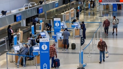 Travellers check in as flights to Tampa, Florida, are cancelled due to Hurricane Milton on Wednesday, Oct. 9, 2024 at the Philadelphia International Airport. Florida travel alert: Hurricane Milton grounds flights, shutters theme parks and closes airports (Photo by Alejandro A. Alvarez/The Philadelphia Inquirer via AP) Travellers check in as flights to Tampa, Florida, are cancelled due to Hurricane Milton on Wednesday, Oct. 9, 2024 at the Philadelphia International Airport. Florida travel alert: Hurricane Milton grounds flights, shutters theme parks and closes airports (Photo by Alejandro A. Alvarez/The Philadelphia Inquirer via AP)