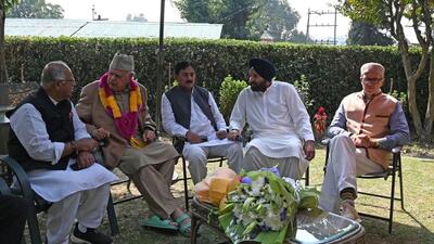 National Conference president Farooq Abdullah along with his son and party vice-president Omar Abdullah meeting AICC J&K affairs in-charge Bharat Solanki and UT Congress president Tariq Hamid Karra at his residence in Srinagar on Wednesday. (Waseem Andrabi/HT) National Conference president Farooq Abdullah along with his son and party vice-president Omar Abdullah meeting AICC J&K affairs in-charge Bharat Solanki and UT Congress president Tariq Hamid Karra at his residence in Srinagar on Wednesday. (Waseem Andrabi/HT)