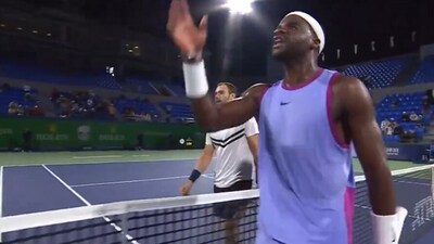Frances Tiafoe charges at the chair umpire. Frances Tiafoe charges at the chair umpire.