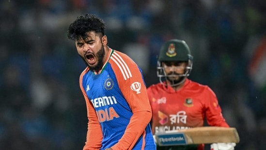 Riyan Parag roared in celebration after dismissing Mehidy Hasan Miraz. (AFP)