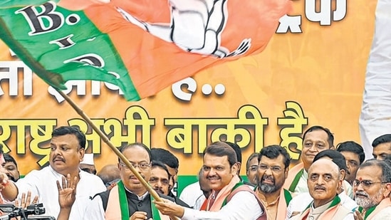 Mumbai, India. Oct 08, 2024: Deputy Chief Minister of Maharashtra Devendra Fadnavis and State President Chandrakant Bawankule, along with BJP party workers, celebrated the victory in the Haryana assembly election in Mumbai.Mumbai, India. Oct 08, 2024. (Photo by Raju Shinde/HT Photo) (Hindustan Times)