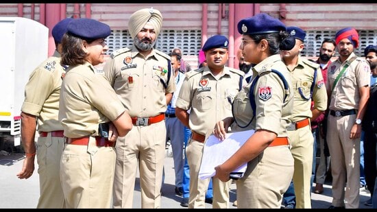 Police officials during checking at Ludhiana bus stand on Wednesday. (Gurpreet Singh/HT)