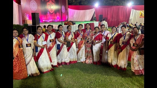 The all- women team of Subhash Talkatora Durga Puja Committee leading this year’s Durga Puja (Sourced)