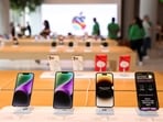 Apple iPhones are seen inside India's first Apple retail store during a media preview, a day ahead of its launch in Mumbai, India