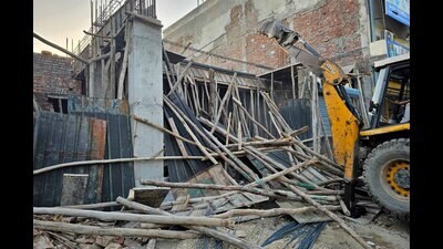 A demolition drive underway in Ludhiana on Thursday. (HT photo) A demolition drive underway in Ludhiana on Thursday. (HT photo)