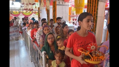 Devotees waiting to pay obeisance at Mansa Devi temple in Panchkula. (Sant Arora/HT)