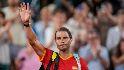 Rafael Nadal reacts waves after the men's doubles quarter-final tennis competition at the Roland Garros stadium (AP) Rafael Nadal reacts waves after the men's doubles quarter-final tennis competition at the Roland Garros stadium (AP)
