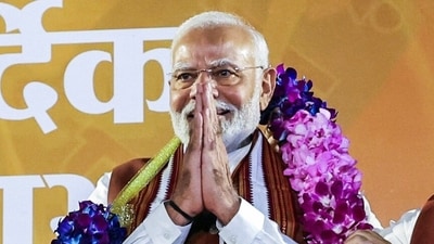 Prime Minister Narendra Modi being garlanded during a programme celebrating Bharatiya Janata Party's (BJP) victory in the Haryana Assembly elections, at party headquarters in New Delhi on October 8. (ANI)
