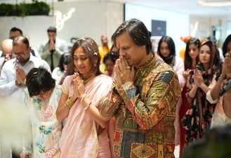 Vivek Oberoi and wife Priyanka during puja at home.