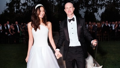 In a post on X, Armstrong shared pictures of the their wedding ceremony where Angela Meng was seen dressed in a white ballgown. (X/ @brian_armstrong)