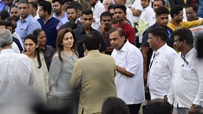 Reliance Industries Chairman Mukesh Ambani, along with his wife Nita, son Aakash, and daughter-in-law Shloka, paid their respects to Ratan Tata at the NCPA on Thursday, where his mortal remains were laid for public homage. (Anshuman Poyrekar/HT Photo)