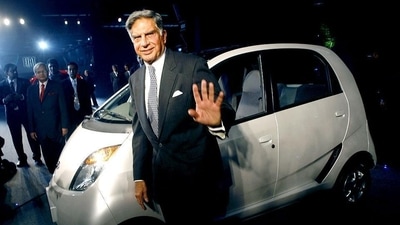 Ratan Tata posing with the Tata Nano (Reuters) Ratan Tata posing with the Tata Nano (Reuters)