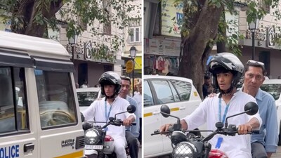 Shantanu Naidu was seen riding a bike in front of the ambulance carrying Ratan Tata's body. Shantanu Naidu was seen riding a bike in front of the ambulance carrying Ratan Tata's body.