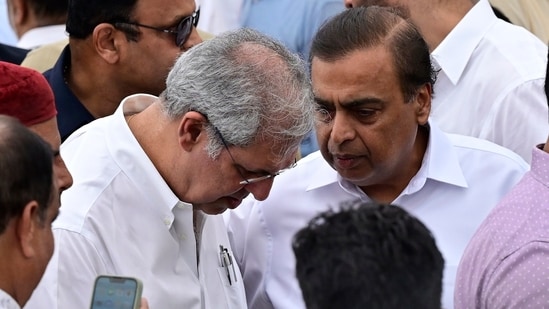Mukesh Ambani interacted with Noel Tata while paying respects at the NCPA during Ratan Tata’s funeral. Noel Tata is vice chairman of Tata Steel and Titan, and his mother, Simone Tata, is chairman of multiple Tata companies.(Anshuman Poyrekar/ Hindustan Times))