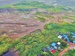 42 acres taken up by a garbage dump, which is being cleared. (Praful Gangurde /HT Photo)