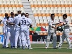 Pakistan's Aamer Jamal and Naseem Shah look dejected after losing the Test