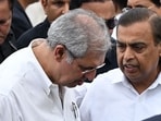 Mukesh Ambani (R), Chairman and Managing Director of Reliance Industries, speaks with Noel Tata, Chairman of Trent and Tata Investment Corporation, after paying his last respect to Indian industrialist Ratan Tata at the National Centre for the Performing Arts (NCPA) ahead of its cremation in Mumbai on October 10, 2024. Crowds of mourners gathered in India's financial capital Mumbai on October 10 for the funeral of industrialist Ratan Tata, hailed as a "titan" who led one of the country's biggest conglomerates.