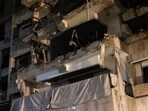 A damaged building stands at the site of an Israeli air strike, amid ongoing hostilities between Hezbollah and Israeli forces, in Beirut, Lebanon,