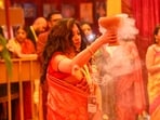 Ashtami and Navami 2024: Devotees perform dhunuchi dance offers prayer to Goddess Durga during the Durga Puja festival on Durga Ashtami. Ashtami and Navami 2024: Devotees perform dhunuchi dance offers prayer to Goddess Durga during the Durga Puja festival on Durga Ashtami.