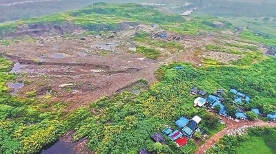 42 acres taken up by a garbage dump, which is being cleared. (Praful Gangurde /HT Photo)