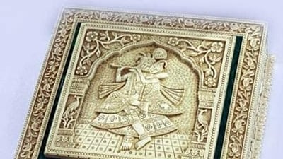 Prime Minister Narendra Modi gifted a Malachite and Camel Bone Box with Radha-Krishna theme to Vandara Siphandone, the wife of PM of Lao PDR, Sonexay Siphandone, in Vientiane on Friday. Crafted from high-quality malachite and intricately carved camel bone, the box combines durability with a luxurious feel. The detailed depiction of Radha and Krishna, capturing their playful interactions, and the traditional motifs and designs add to its cultural significance. The exquisite malachite and camel bone box with the Radha Krishna theme is more than just an ornamental object; it is a celebration of art, culture, and spirituality. Its unique design and high-quality craftsmanship make it a timeless piece that will be treasured for generations. Prime Minister Narendra Modi gifted a Malachite and Camel Bone Box with Radha-Krishna theme to Vandara Siphandone, the wife of PM of Lao PDR, Sonexay Siphandone, in Vientiane on Friday. Crafted from high-quality malachite and intricately carved camel bone, the box combines durability with a luxurious feel. The detailed depiction of Radha and Krishna, capturing their playful interactions, and the traditional motifs and designs add to its cultural significance. The exquisite malachite and camel bone box with the Radha Krishna theme is more than just an ornamental object; it is a celebration of art, culture, and spirituality. Its unique design and high-quality craftsmanship make it a timeless piece that will be treasured for generations.