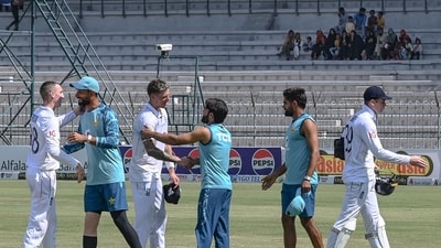 Players shake hands with each other at the end of the first Test cricket match. (AFP) Players shake hands with each other at the end of the first Test cricket match. (AFP)