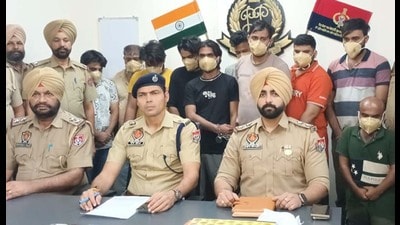 Fraud accused in police custody in Dugri, Ludhiana, on Friday. (HT photo)