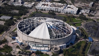 The destroyed roof of the Tropicana Field is seen in the aftermath of Hurricane Milton, Thursday, Oct. 10, 2024, in St. Petersburg, Fla. (AP Photo/Gerald Herbert) (AP) The destroyed roof of the Tropicana Field is seen in the aftermath of Hurricane Milton, Thursday, Oct. 10, 2024, in St. Petersburg, Fla. (AP Photo/Gerald Herbert) (AP)